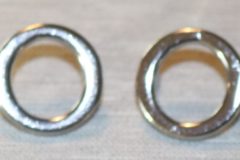 Dörrlåsknapp, Genomföring