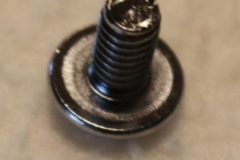 Skruv för ändclips