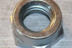 Låsmutter för växelspaksknopp