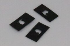 Låsplatta för emblem etc.